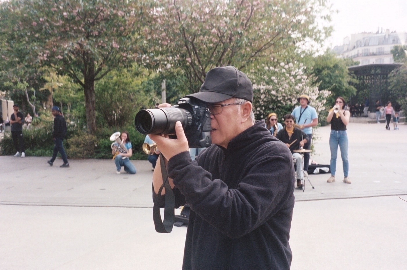 Potato camera being used by potato photographer in Paris. Photo taken with Leica Z2X in Paris by Josh Withers.